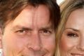 Charlie Sheen’s wife checks into rehab over ‘crack-whore allegation’.