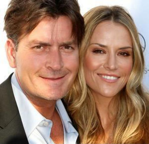 Charlie Sheen’s wife checks into rehab over ‘crack-whore allegation’.